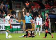 13 June 2025; Greg Bolger of Cork City is shown a yellow card by /ref/during the SSE Airtricity Men's Premier Division match between Cork City and Bohemians at Turner's Cross in Cork. Photo by Michael P Ryan/Sportsfile