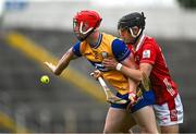 15 June 2025; Niall Doyle of Clare in action against Sam Ring of Cork during the Electric Ireland GAA Hurling All-Ireland Minor Championship semi-final match between Cork and Clare at FBD Semple Stadium in Thurles, Tipperary. Photo by Brendan Moran/Sportsfile