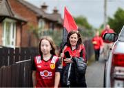 15 June 2025; Down supporters make their way to the grounds before the GAA Football All-Ireland Senior Championship Round 3 match between Monaghan and Down at BOX-IT Athletic Grounds in Armagh. Photo by Thomas Flinkow/Sportsfile