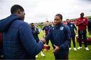 15 June 2025; Keacy Carty of West Indies is presented with his cap before his debut in match three of the T20 International Series between Ireland and the West Indies at Bready Cricket Club in Magheramason, Tyrone. Photo by Ramsey Cardy/Sportsfile