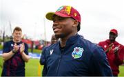 15 June 2025; Keacy Carty of West Indies is presented with his cap before his debut in match three of the T20 International Series between Ireland and the West Indies at Bready Cricket Club in Magheramason, Tyrone. Photo by Ramsey Cardy/Sportsfile