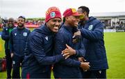 15 June 2025; Keacy Carty of West Indies is presented with his cap before his debut in match three of the T20 International Series between Ireland and the West Indies at Bready Cricket Club in Magheramason, Tyrone. Photo by Ramsey Cardy/Sportsfile