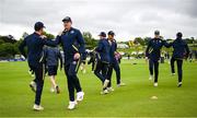 15 June 2025; The Ireland team warm-up before match three of the T20 International Series between Ireland and the West Indies at Bready Cricket Club in Magheramason, Tyrone. Photo by Ramsey Cardy/Sportsfile