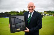 15 June 2025; Former Ireland international Peter Gillespie is presented with his 100th cap before match three of the T20 International Series between Ireland and the West Indies at Bready Cricket Club in Magheramason, Tyrone. Photo by Ramsey Cardy/Sportsfile