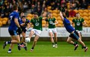 14 June 2025; Cathal Hickey of Meath scores a point despite the efforts of Mike Breen, left, Paul Murphy of Kerry during the GAA Football All-Ireland Senior Championship Round 3 match between Kerry and Meath at Glenisk O'Connor Park in Tullamore, Offaly. Photo by Tom Beary/Sportsfile