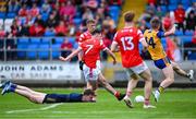 15 June 2025; Craig Lennon of Louth gets past Clare goalkeeper Eamon Tubridy to have a shot on goal during the GAA Football All-Ireland Senior Championship Round 3 match between Louth and Clare at Laois Hire O'Moore Park in Portlaoise, Laois. Photo by Shauna Clinton/Sportsfile