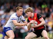15 June 2025; Kieran Duffy of Monaghan in action against Patrick McCarthy of Down during the GAA Football All-Ireland Senior Championship Round 3 match between Monaghan and Down at BOX-IT Athletic Grounds in Armagh. Photo by Thomas Flinkow/Sportsfile