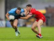 14 June 2025; John Small of Dublin in action against Dan Higgins of Derry during the GAA Football All-Ireland Senior Championship Round 3 match between Dublin and Derry at Páirc Esler in Newry, Down. Photo by Thomas Flinkow/Sportsfile