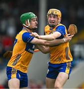 15 June 2025; Darragh Murrihy, left, and Ian O'Brien of Clare celebrate at the final whistle of the Electric Ireland GAA Hurling All-Ireland Minor Championship semi-final match between Cork and Clare at FBD Semple Stadium in Thurles, Tipperary. Photo by Brendan Moran/Sportsfile