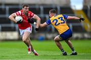 15 June 2025; Sam Mulroy of Louth is tackled by Emmet McMahon of Clare during the GAA Football All-Ireland Senior Championship Round 3 match between Louth and Clare at Laois Hire O'Moore Park in Portlaoise, Laois. Photo by Shauna Clinton/Sportsfile