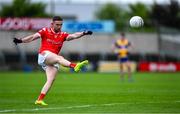 15 June 2025; Ciaran Downey of Louth kicks a point during the GAA Football All-Ireland Senior Championship Round 3 match between Louth and Clare at Laois Hire O'Moore Park in Portlaoise, Laois. Photo by Shauna Clinton/Sportsfile