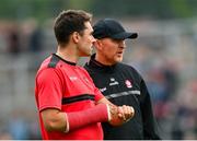14 June 2025; Derry manager Paddy Tally, right, and strength and conditioning coach Cairbre Ó Cairealláin before the GAA Football All-Ireland Senior Championship Round 3 match between Dublin and Derry at Páirc Esler in Newry, Down. Photo by Ramsey Cardy/Sportsfile