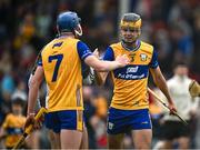 15 June 2025; Clare players Jack O'Halloran, right, and Colm Daly celebrate after the Electric Ireland GAA Hurling All-Ireland Minor Championship semi-final match between Cork and Clare at FBD Semple Stadium in Thurles, Tipperary. Photo by Brendan Moran/Sportsfile
