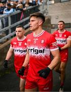 14 June 2025; Conor Doherty of Derry walks out for the second half of the GAA Football All-Ireland Senior Championship Round 3 match between Dublin and Derry at Páirc Esler in Newry, Down. Photo by Ramsey Cardy/Sportsfile