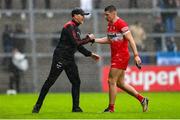 14 June 2025; Derry manager Paddy Tally, left, and Ciaran McFaul during the GAA Football All-Ireland Senior Championship Round 3 match between Dublin and Derry at Páirc Esler in Newry, Down. Photo by Ramsey Cardy/Sportsfile