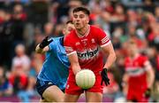 14 June 2025; Conor Doherty of Derry in action against Con O'Callaghan of Dublin during the GAA Football All-Ireland Senior Championship Round 3 match between Dublin and Derry at Páirc Esler in Newry, Down. Photo by Ramsey Cardy/Sportsfile