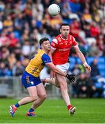 15 June 2025; Tommy Durnin of Louth is tackled by Ronan Lanigan of Clare during the GAA Football All-Ireland Senior Championship Round 3 match between Louth and Clare at Laois Hire O'Moore Park in Portlaoise, Laois. Photo by Shauna Clinton/Sportsfile