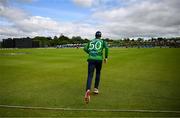 15 June 2025; George Dockrell of Ireland during match three of the T20 International Series between Ireland and the West Indies at Bready Cricket Club in Magheramason, Tyrone. Photo by Ramsey Cardy/Sportsfile