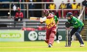 15 June 2025; West Indies batter Shai Hope and Ireland wicketkeeper Lorcan Tucker during match three of the T20 International Series between Ireland and the West Indies at Bready Cricket Club in Magheramason, Tyrone. Photo by Ramsey Cardy/Sportsfile