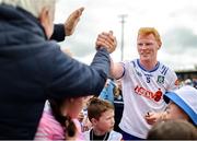 15 June 2025; Ryan O'Toole of Monaghan shakes hands with a supporter after the GAA Football All-Ireland Senior Championship Round 3 match between Monaghan and Down at BOX-IT Athletic Grounds in Armagh. Photo by Thomas Flinkow/Sportsfile