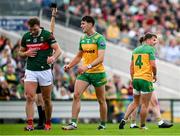 15 June 2025; Peadar Mogan of Donegal, 4, is shown a black card by referee Paul Faloon during the GAA Football All-Ireland Senior Championship Round 3 match between Donegal and Mayo at King & Moffatt Dr Hyde Park in Roscommon. Photo by Seb Daly/Sportsfile