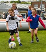 15 June 2025; Lucy Flynn in action during the Honouring Every Woman event at Graun Park in Tramore AFC, Waterford. Photo by Matt Browne/Sportsfile
