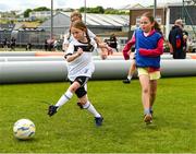 15 June 2025; Lucy Flynn in action during the Honouring Every Woman event at Graun Park in Tramore AFC, Waterford. Photo by Matt Browne/Sportsfile
