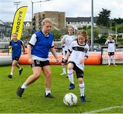 15 June 2025; Lucy Flynn in action during the Honouring Every Woman event at Graun Park in Tramore AFC, Waterford. Photo by Matt Browne/Sportsfile