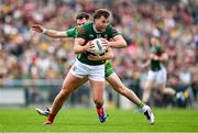 15 June 2025; Aidan O’Shea of Mayo in action against Caolan McColgan of Donegal during the GAA Football All-Ireland Senior Championship Round 3 match between Donegal and Mayo at King & Moffatt Dr Hyde Park in Roscommon. Photo by Seb Daly/Sportsfile