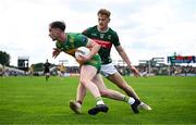 15 June 2025; Ciaran Thompson of Donegal in action against Jack Carney of Mayo during the GAA Football All-Ireland Senior Championship Round 3 match between Donegal and Mayo at King & Moffatt Dr Hyde Park in Roscommon. Photo by Seb Daly/Sportsfile