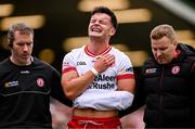 15 June 2025; Michael McKernan of Tyrone leaves the pitch with an injury during the GAA Football All-Ireland Senior Championship Round 3 match between Tyrone and Cavan at Brewster Park in Enniskillen, Fermanagh. Photo by Ben McShane/Sportsfile