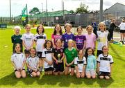 15 June 2025; Jane O'Sullivan captain of the under-10 team lifts the trophy with her team-mates during the Honouring Every Woman event at Graun Park in Tramore, Waterford. Photo by Matt Browne/Sportsfile
