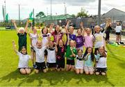 15 June 2025; Jane O'Sullivan captain of the under-10 team lifts the trophy as her team-mates celebrate during the Honouring Every Woman event at Graun Park in Tramore, Waterford. Photo by Matt Browne/Sportsfile