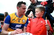 15 June 2025; Tommy Durnin of Louth with supporter Stephen Gregory after the GAA Football All-Ireland Senior Championship Round 3 match between Louth and Clare at Laois Hire O'Moore Park in Portlaoise, Laois. Photo by Shauna Clinton/Sportsfile