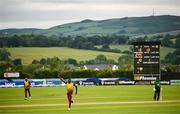 15 June 2025; Jason Holder of West Indies celebrates taking the wicket of Paul Stirling of Ireland during match three of the T20 International Series between Ireland and the West Indies at Bready Cricket Club in Magheramason, Tyrone. Photo by Ramsey Cardy/Sportsfile