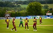 15 June 2025; Jason Holder of West Indies celebrates taking the wicket of Paul Stirling of Ireland during match three of the T20 International Series between Ireland and the West Indies at Bready Cricket Club in Magheramason, Tyrone. Photo by Ramsey Cardy/Sportsfile