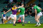 15 June 2025; Mark Rossiter of Wexford shoots to score his side's second goal during the Tailteann Cup quarter-final match between Limerick and Wexford at TUS Gaelic Grounds in Limerick. Photo by Tom Beary/Sportsfile