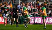 15 June 2025; Ciaran Moore of Donegal, centre, celebrates with teammate Ciaran Thompson after kicking their side's winning point after the full time buzzer during the GAA Football All-Ireland Senior Championship Round 3 match between Donegal and Mayo at King & Moffatt Dr Hyde Park in Roscommon. Photo by Seb Daly/Sportsfile