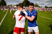 15 June 2025; Dara McVeety of Cavan and Kieran McGeary of Tyrone after the GAA Football All-Ireland Senior Championship Round 3 match between Tyrone and Cavan at Brewster Park in Enniskillen, Fermanagh. Photo by Ben McShane/Sportsfile