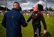 15 June 2025; Tyrone manager Malachy O'Rourke, right, and Cavan manager Raymond Galligan shake hands after the GAA Football All-Ireland Senior Championship Round 3 match between Tyrone and Cavan at Brewster Park in Enniskillen, Fermanagh. Photo by Ben McShane/Sportsfile