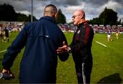 15 June 2025; Tyrone manager Malachy O'Rourke, right, and Cavan manager Raymond Galligan shake hands after the GAA Football All-Ireland Senior Championship Round 3 match between Tyrone and Cavan at Brewster Park in Enniskillen, Fermanagh. Photo by Ben McShane/Sportsfile