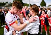 15 June 2025; An emotional Conor Meyler of Tyrone is consoled by his mother Paula following his return to action after a 23 month absence due to injury after the GAA Football All-Ireland Senior Championship Round 3 match between Tyrone and Cavan at Brewster Park in Enniskillen, Fermanagh. Photo by Ben McShane/Sportsfile