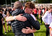 15 June 2025; An emotional Conor Meyler of Tyrone is consoled by his father Seanie following his return to action after a 23 month absence due to injury after the GAA Football All-Ireland Senior Championship Round 3 match between Tyrone and Cavan at Brewster Park in Enniskillen, Fermanagh. Photo by Ben McShane/Sportsfile