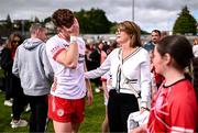 15 June 2025; An emotional Conor Meyler of Tyrone is consoled by his mother Paula following his return to action after a 23 month absence due to injury after the GAA Football All-Ireland Senior Championship Round 3 match between Tyrone and Cavan at Brewster Park in Enniskillen, Fermanagh. Photo by Ben McShane/Sportsfile