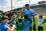 15 June 2025; Limerick goalkeeper Josh Ryan gives away a pair of goalkeeper gloves to young supporters after the Tailteann Cup quarter-final match between Limerick and Wexford at TUS Gaelic Grounds in Limerick. Photo by Tom Beary/Sportsfile