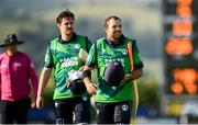 15 June 2025; Liam McCarthy, right, and Mark Adair of Ireland after their side's defeat in match three of the T20 International Series between Ireland and the West Indies at Bready Cricket Club in Magheramason, Tyrone. Photo by Ramsey Cardy/Sportsfile
