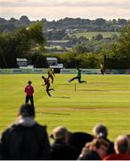 15 June 2025; Mark Adair of Ireland skips over the ball during match three of the T20 International Series between Ireland and the West Indies at Bready Cricket Club in Magheramason, Tyrone. Photo by Ramsey Cardy/Sportsfile