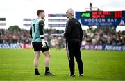 15 June 2025; Donegal manager Jim McGuinness in conversation with goalkeeper Shaun Patton during the GAA Football All-Ireland Senior Championship Round 3 match between Donegal and Mayo at King & Moffatt Dr Hyde Park in Roscommon. Photo by Seb Daly/Sportsfile