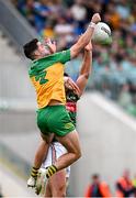 15 June 2025; Brendan McCole of Donegal in action against Aidan O’Shea of Mayo during the GAA Football All-Ireland Senior Championship Round 3 match between Donegal and Mayo at King & Moffatt Dr Hyde Park in Roscommon. Photo by Seb Daly/Sportsfile