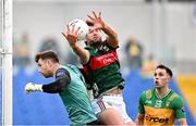 15 June 2025; Aidan O’Shea of Mayo in action against Donegal goalkeeper Shaun Patton during the GAA Football All-Ireland Senior Championship Round 3 match between Donegal and Mayo at King & Moffatt Dr Hyde Park in Roscommon. Photo by Seb Daly/Sportsfile